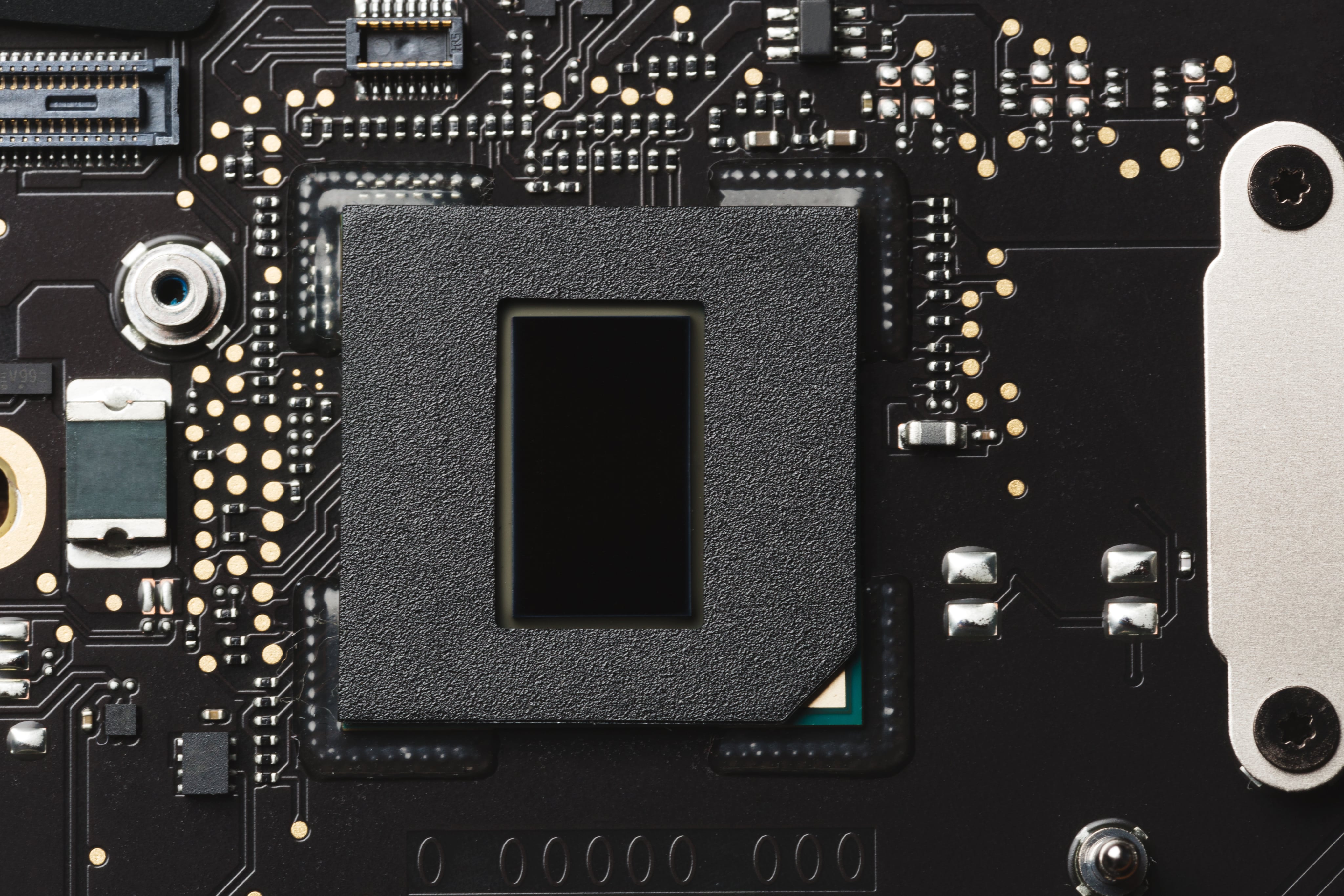 A close-up of a microprocessor on a motherboard, the central processing unit that powers a computer.